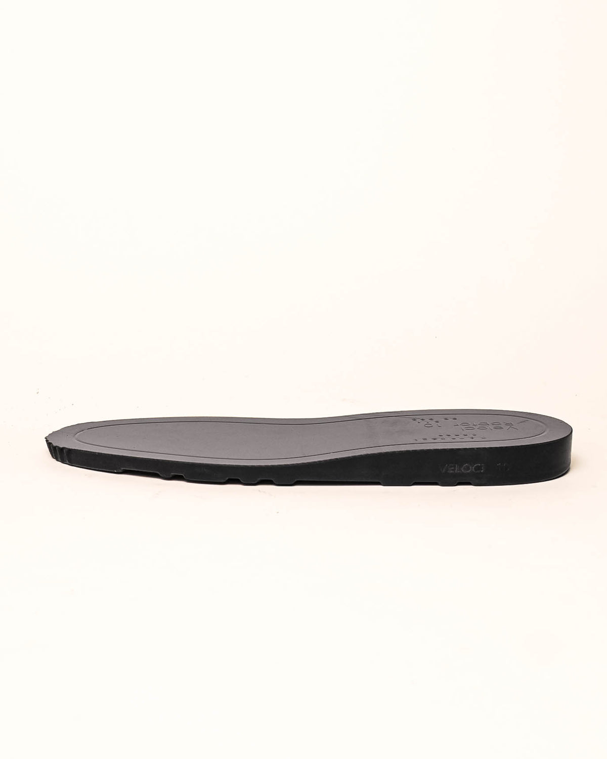 Black wedge showing the side profile with white background.